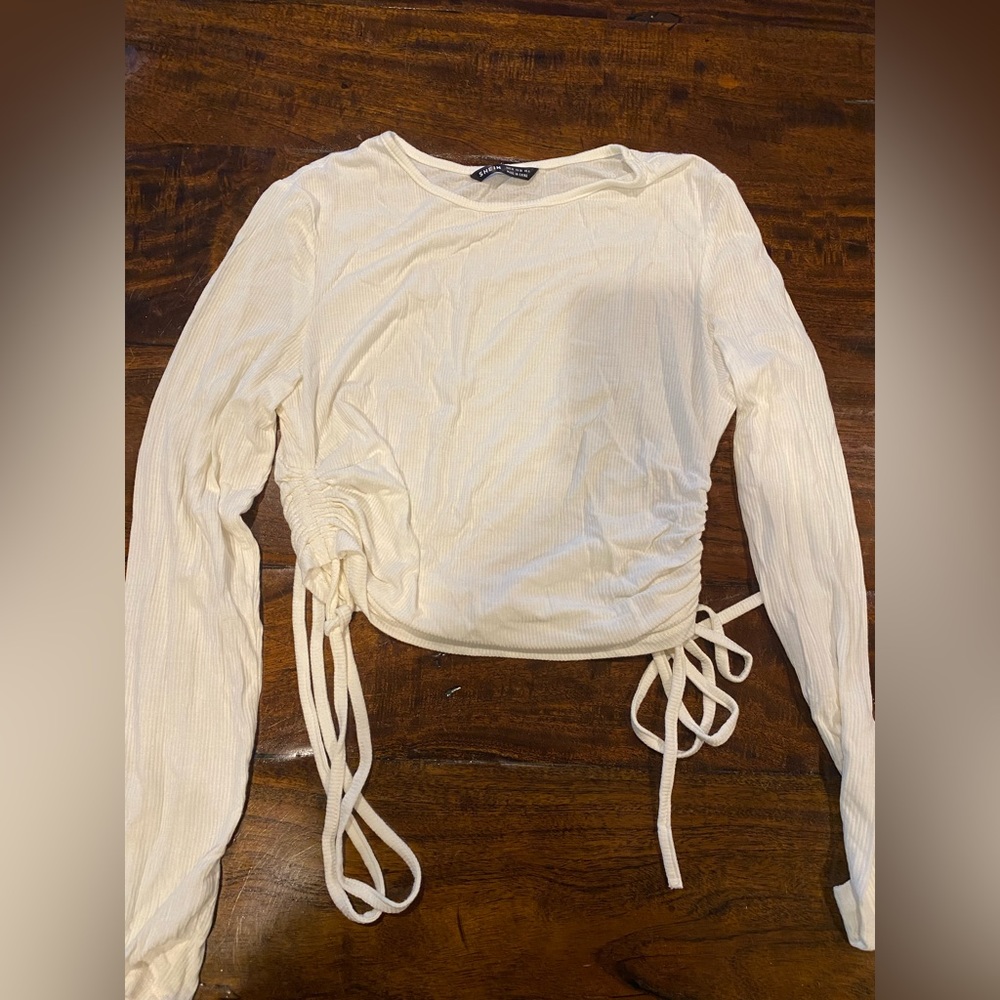 Long sleeve, white ribbed cinched sides!